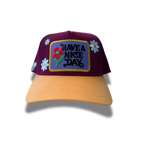 “Have a Nice Day” Flower Patch Trucker Hat – Purple & Gold